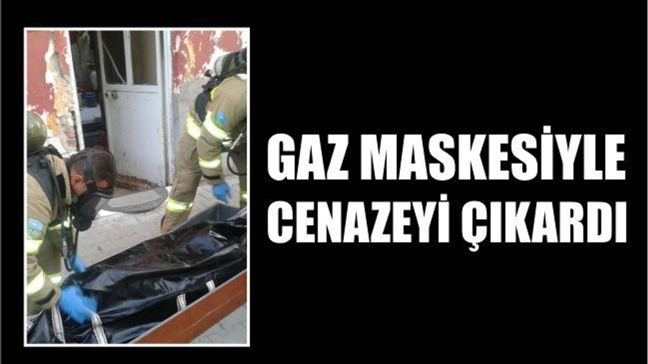GAZ MASKESİYLE CENAZEYİ ÇIKARDI