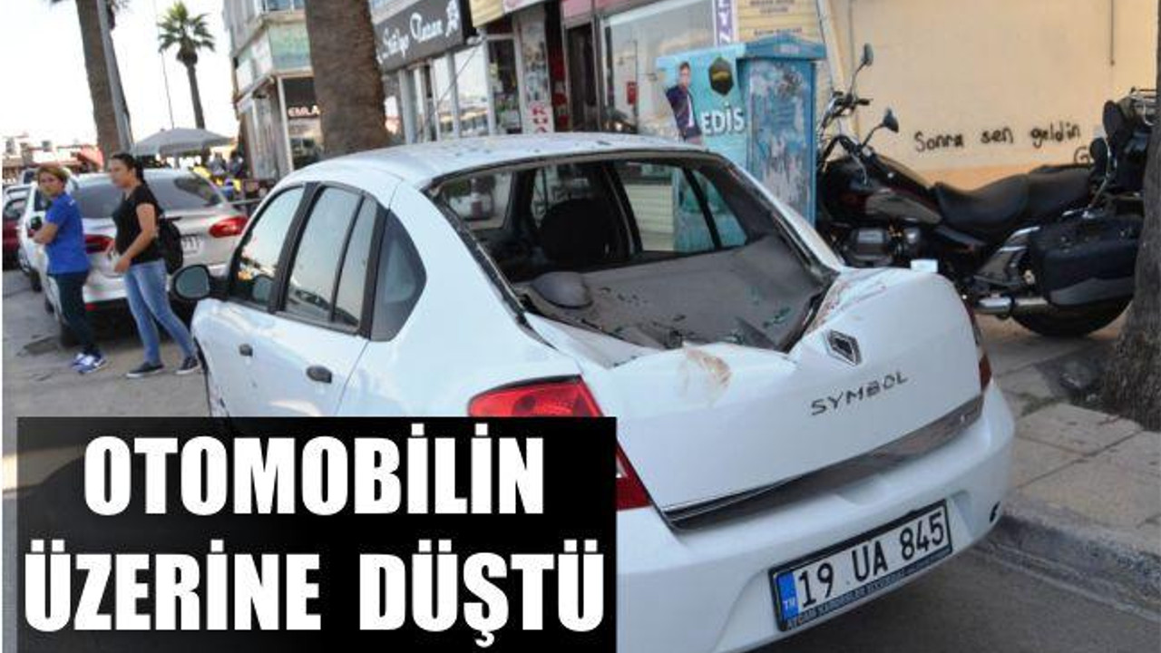 OTOMOBİLİN ÜZERİNE DÜŞTÜ