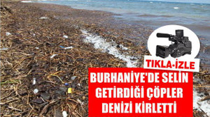 Burhaniye’de selin getirdiği çöpler denizi kirletti